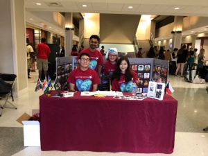 students sitting together at the CLC table in the Ferguson Student Center