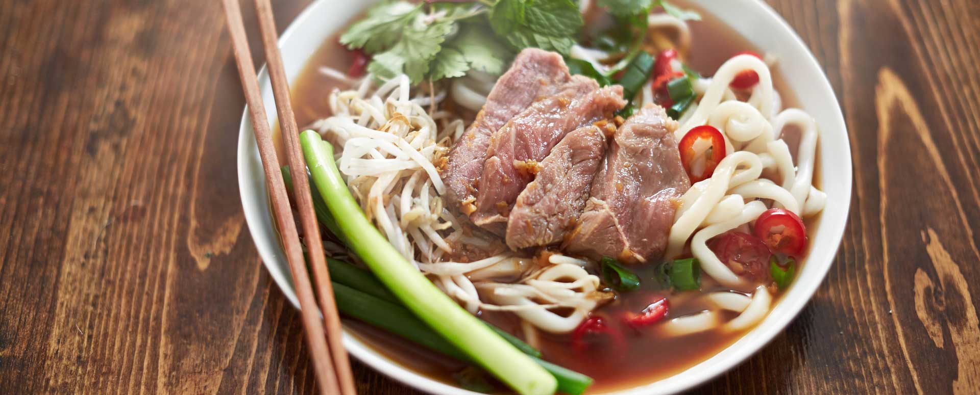a bowl of pho, a vietnamese soup